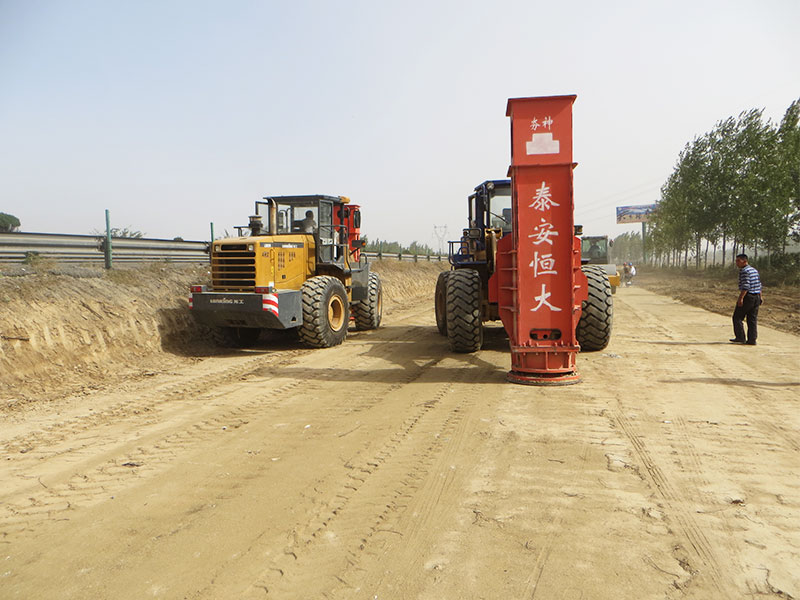 Two Rapid Impact Compactors are installed on the loader for alternate construction