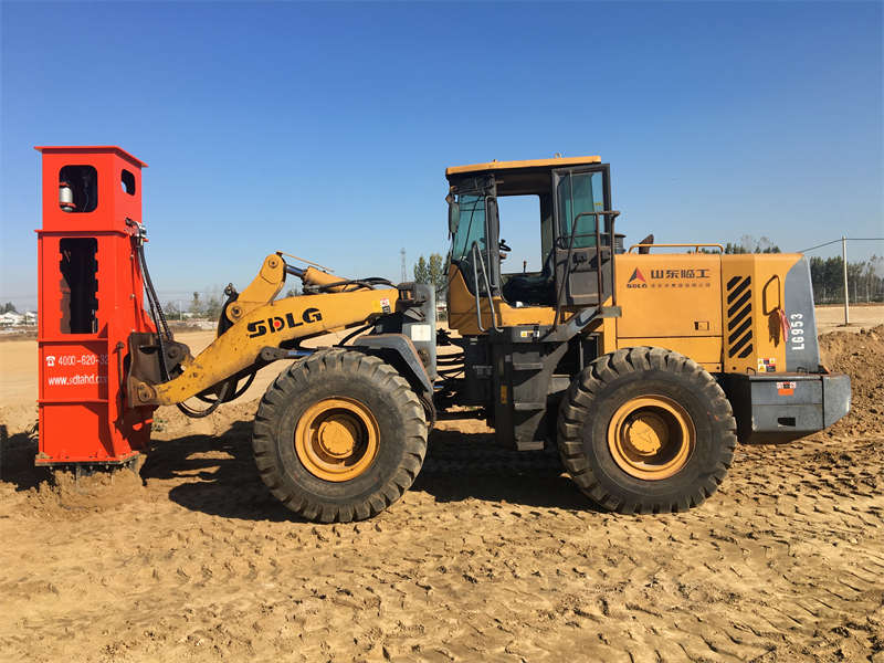 The tamping machine is installed on the loader for construction