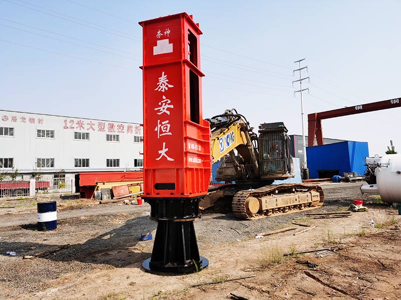 The Rapid Impact Compactor is installed on the excavator