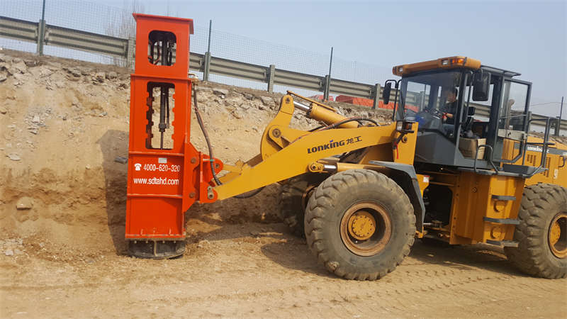 The Rapid Impact Compaction is installed on the loader for construction